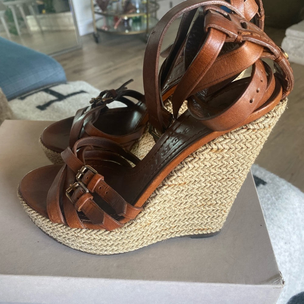 Burberry wedges size 7 with double straps that wrap up your leg.